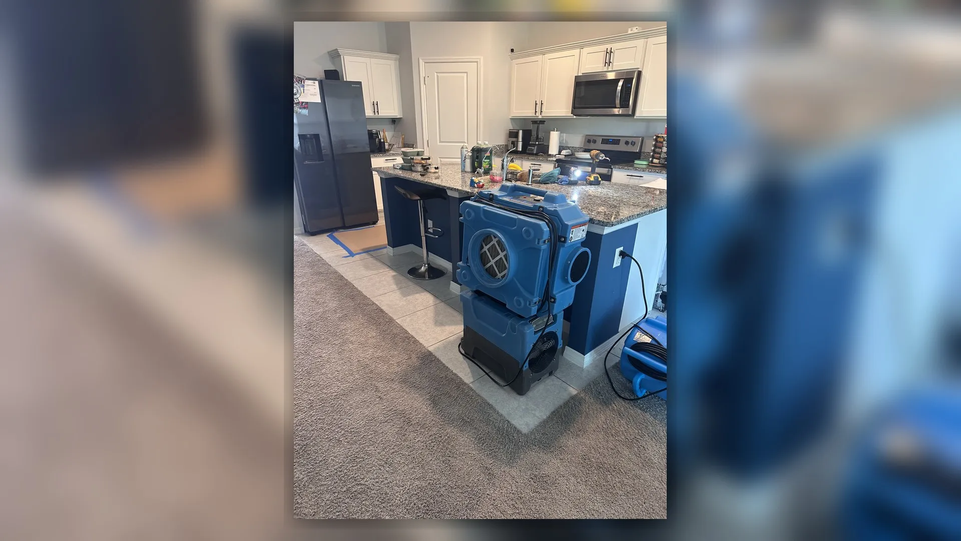 Restoration equipment staged during a water damage response