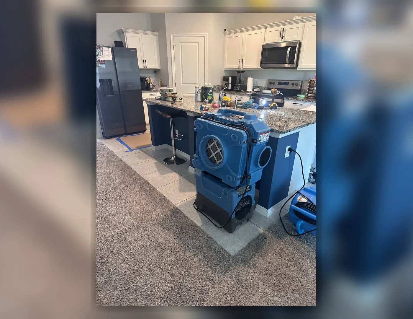 Blue drying machines staged during water extraction and controlled drying